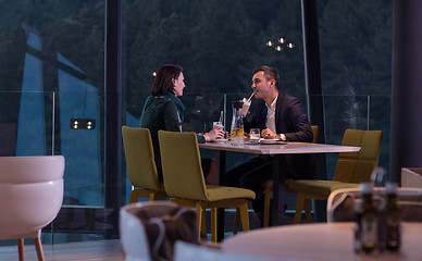 Image showing loving couple enjoying romantic dinner