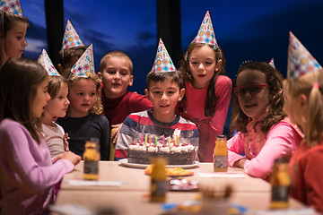 Image showing young boy having birthday party