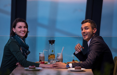 Image showing loving couple enjoying romantic dinner