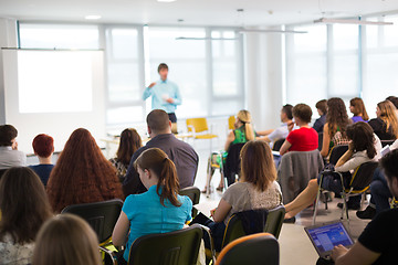 Image showing Speaker giving presentation on business conference meeting.