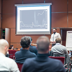 Image showing Skiled Public Speaker Giving a Talk at Business Meeting.