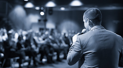 Image showing Public speaker giving talk at business event.