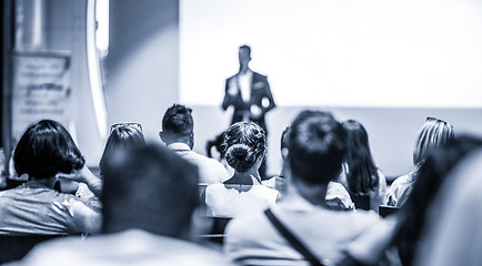 Image showing Business speaker giving a talk at business conference event.