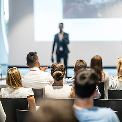 Image showing Male business speaker giving a talk at business conference event.