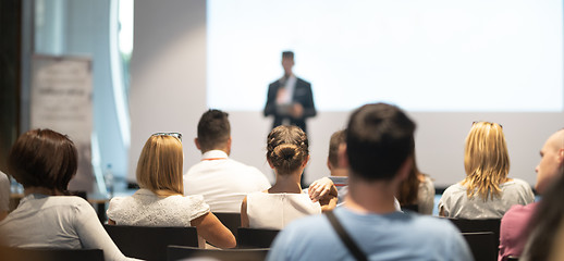 Image showing Male business speaker giving a talk at business conference event.