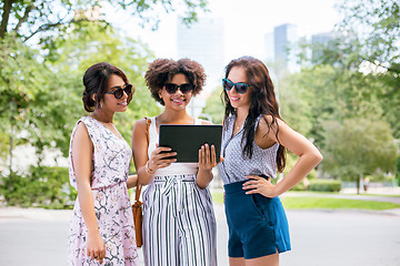 Image showing women with tablet computer on street in summer