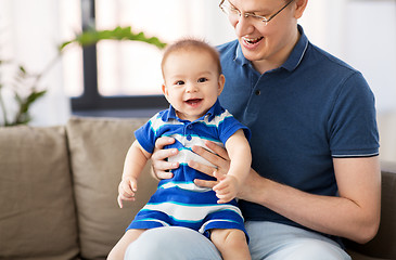 Image showing happy father with baby son at home