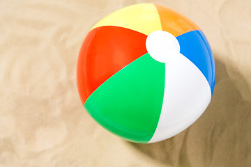 Image showing close up of inflatable beach ball on sand