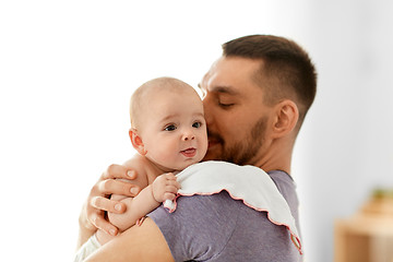 Image showing father with little baby girl at home