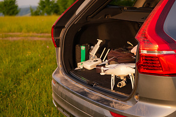 Image showing drone ready for fly in suv trunk l