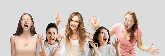 Image showing Young people in stress isolated on white studio background