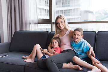 Image showing young mother spending time with kids