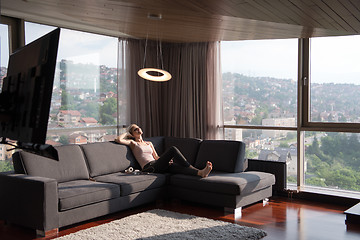 Image showing woman using tablet in beautiful apartment