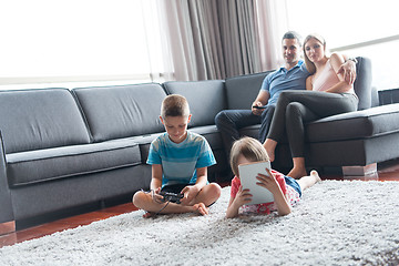 Image showing couple spending time with kids