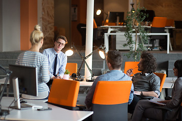 Image showing Young Business Team At A Meeting at modern office building