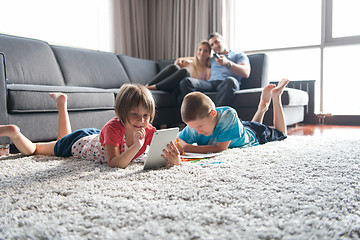 Image showing young couple spending time with kids