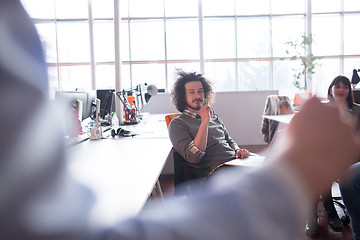 Image showing Young Business Team At A Meeting at modern office building