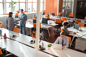 Image showing Two Business People Working With laptop in office