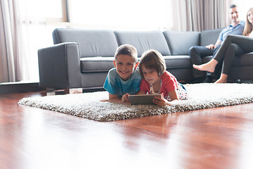 Image showing couple spending time with kids