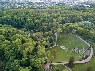 Image showing Aerial panoramic view from the drone to the national dendrological park Sofiyivka in city Uman, Ukraine in the summer at sunset