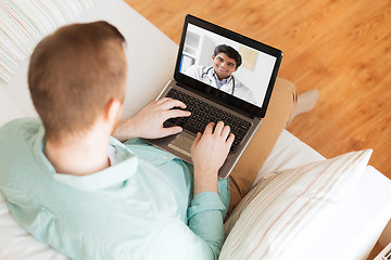 Image showing patient having video call with doctor on laptop