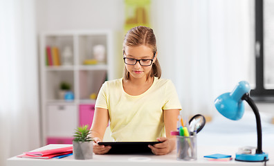 Image showing student girl with tablet computer doing homework