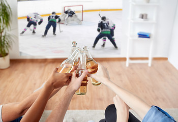 Image showing friends watching ice hockey and drinking beer
