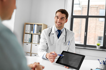 Image showing doctor with tablet computer and patient at clinic