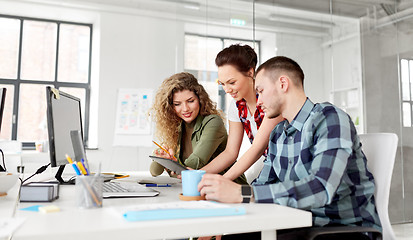 Image showing creative team with laptop working at office