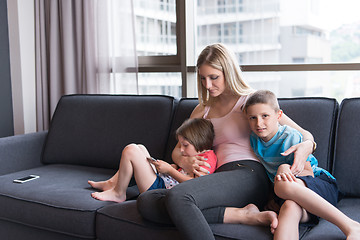 Image showing young mother spending time with kids