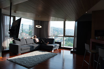 Image showing woman using tablet in beautiful apartment