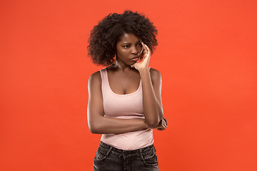 Image showing Young serious thoughtful business woman. Doubt concept.