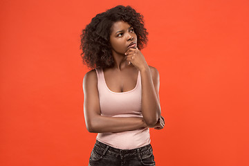 Image showing Young serious thoughtful business woman. Doubt concept.