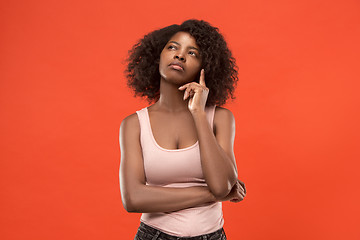 Image showing Young serious thoughtful business woman. Doubt concept.