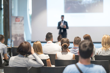 Image showing Male business speaker giving a talk at business conference event.