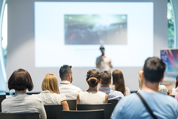 Image showing Male business speaker giving a talk at business conference event.