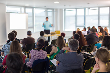 Image showing Speaker giving presentation on business conference lecture.