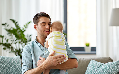 Image showing father with little baby daughter at home