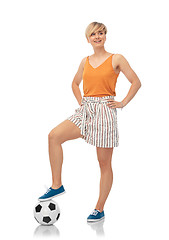 Image showing smiling teenage girl with soccer ball