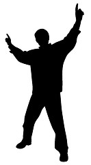 Image showing Happy man celebrating victory or cheering with raised hands pointing fingers up