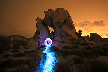 Image showing Person Light Painted in the Desert Under the Night Sky