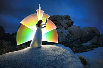 Image showing Person Light Painted in the Desert Under the Night Sky