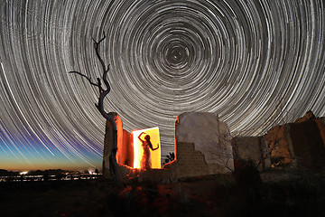 Image showing Person Light Painted in the Desert Under the Night Sky