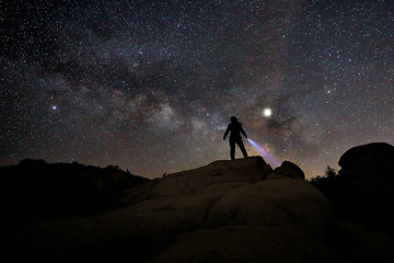 Image showing Person Light Painted in the Desert Under the Night Sky