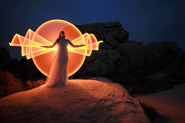 Image showing Person Light Painted in the Desert Under the Night Sky