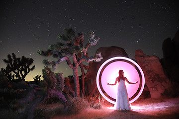 Image showing Person Light Painted in the Desert Under the Night Sky