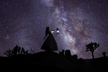 Image showing Person Light Painted in the Desert Under the Night Sky