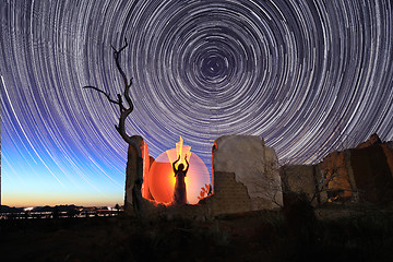 Image showing Person Light Painted in the Desert Under the Night Sky