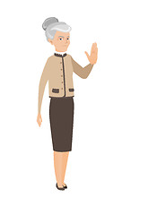 Image showing Senior caucasian business woman showing palm hand.