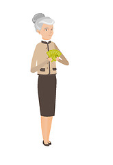 Image showing Senior caucasian business woman holding money.